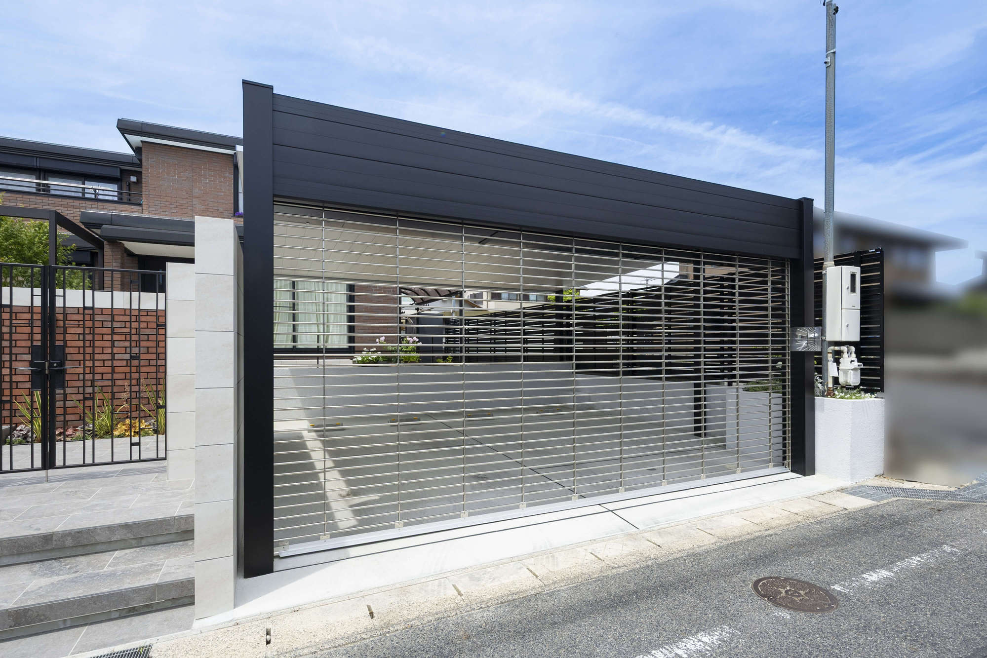 愛知県 尾張旭市 外構 エクステリア リフォーム  リノベーション ガーデンリフォーム ペットと遊ぶ庭 庭じまい シャッターゲート ガレージ